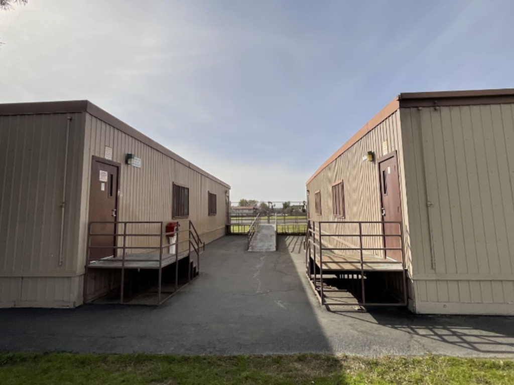 Two 24' x 40' modular buildings used as offices on a church campus.